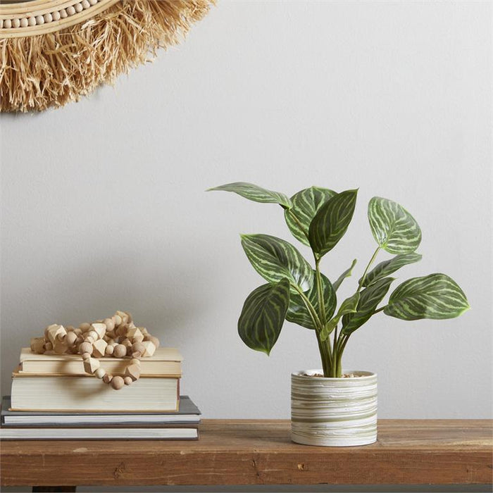 The Novogratz Green Faux Foliage Calathea Artificial Plant with Realistic Leaves and Patterned Porcelain Pot